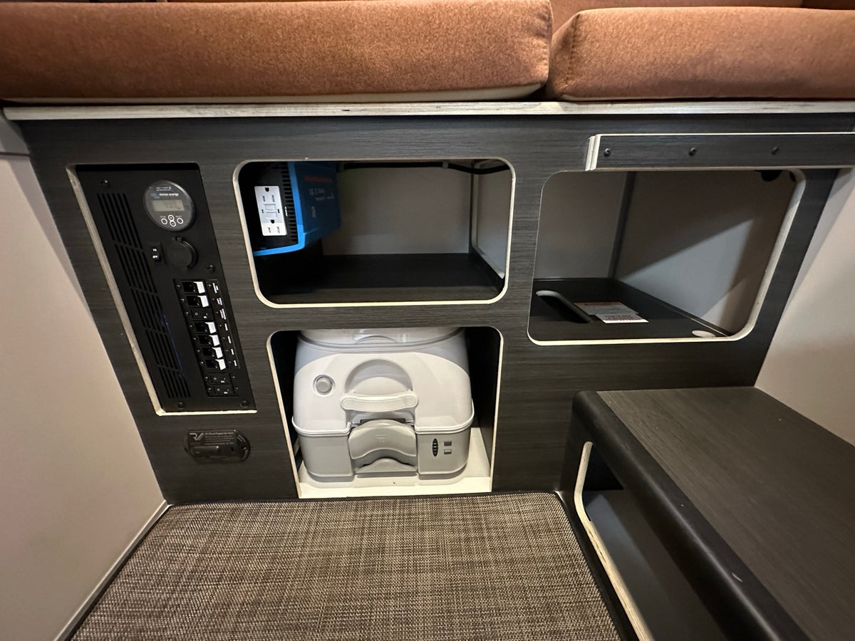 Portable toilet in a Scout camper