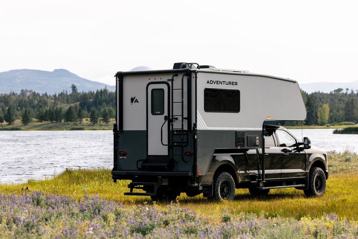 Truck camper fitted to a pickup bed showing overall proportions