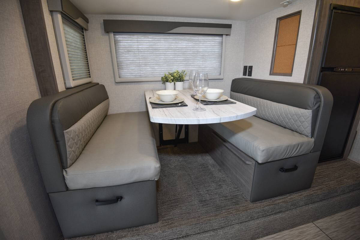 Lance camper dinette seating in face-to-face set up